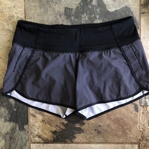 Black and white Lululemon running shorts